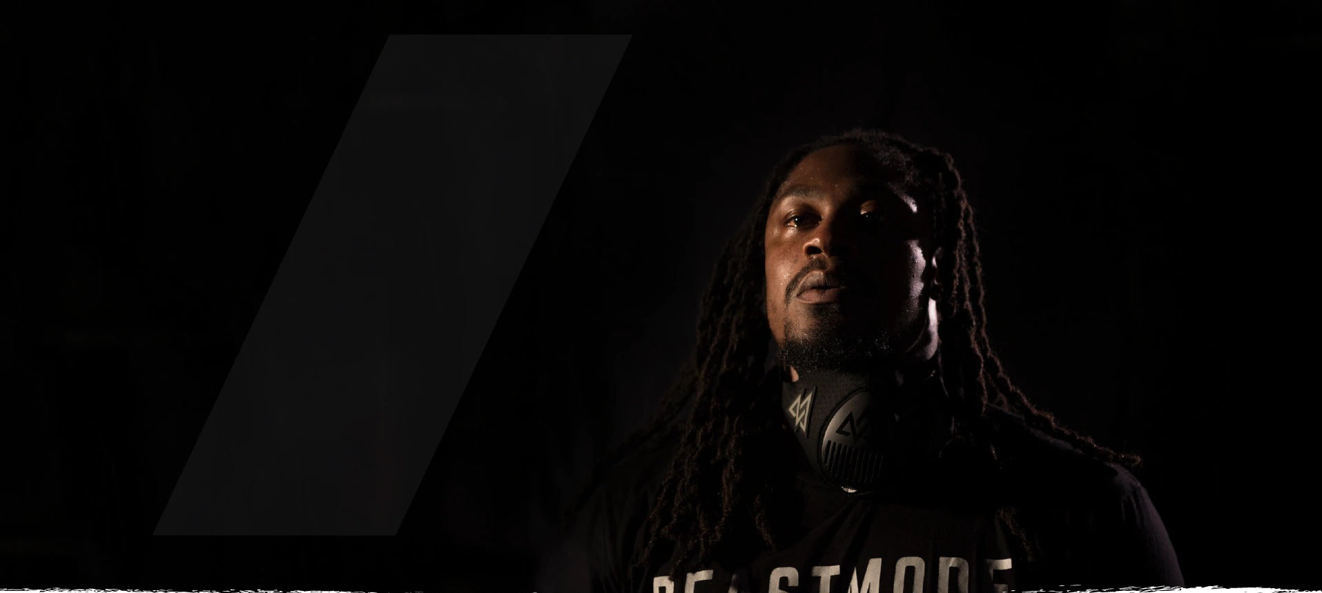 Marshawn Lynch in photo wearing Training Mask 3.0 around neck