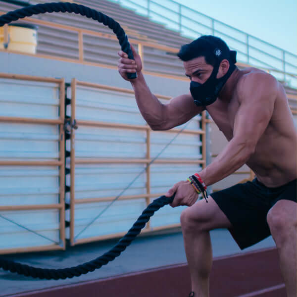 Training Mask 2.0- Training Mask 2.0 user with battle ropes