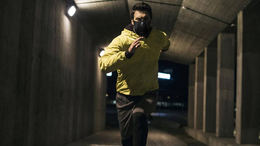 a guy sprinting at night on a hallway while wearing a trainingmask 3.0